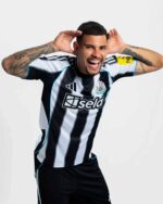 Newcastle United 2025/26 home football jersey with black and white stripes, official club crest, and.