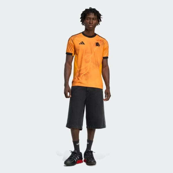Authentic Roma away football jersey for 2025/26 season, orange with black accents.
