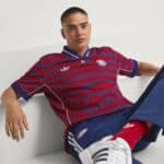 Authentic Bayern Munich football jersey 2025/26 season, red and blue design.