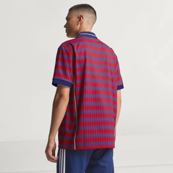 Authentic Bayern Munich football jersey for 2025/26 season, featuring vibrant red and blue design.