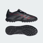 Black Predator soccer cleat with red accents, side view, studded sole visible against a light background