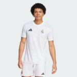 Authentic Real Madrid 2023/24 home football jersey and shorts, white with team logos.