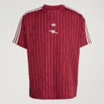 Red pinstriped Adidas jersey with white three-stripe sleeves and trefoil logo on the chest, shown from the front torso.