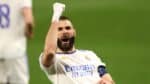 Celebrating Real Madrid football victory with passionate player on the field.