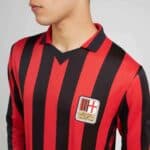Milan FC red and black striped football jersey with club badge.