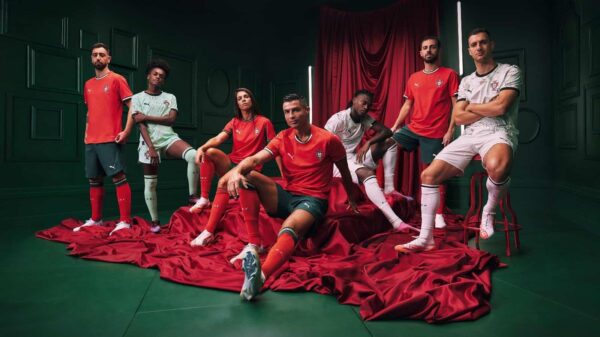 Portugal away jersey 2025 worn by football players in a studio setting.