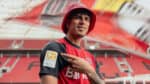 Bayer Leverkusen 2024/25 home football jersey with club logo and red-black design.