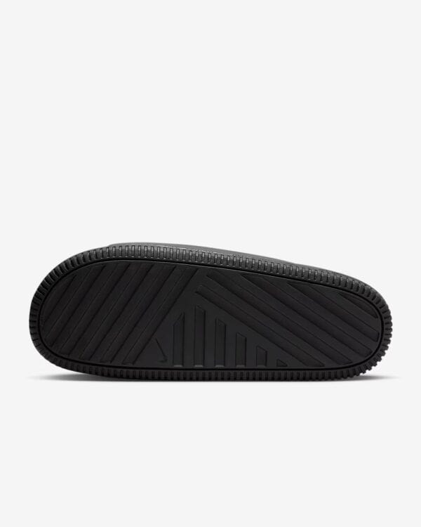 Black Nike Calm Slide for comfortable casual wear.