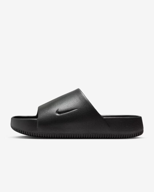 Black Nike slide sandal for casual wear and comfort.
