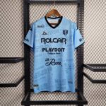 Authentic Necaxa soccer jersey for 2023/24 season, featuring team logos and sponsor details.