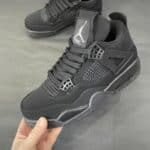 Authentic Air Jordan 4 Black sneakers for men and women. Stylish, comfortable, and perfect for sport.