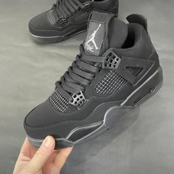 Authentic Air Jordan 4 Black sneakers for men and women. Stylish, comfortable, and perfect for sport.