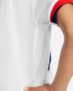 Kids PSG away football kit 2024/25, white with red and blue accents.