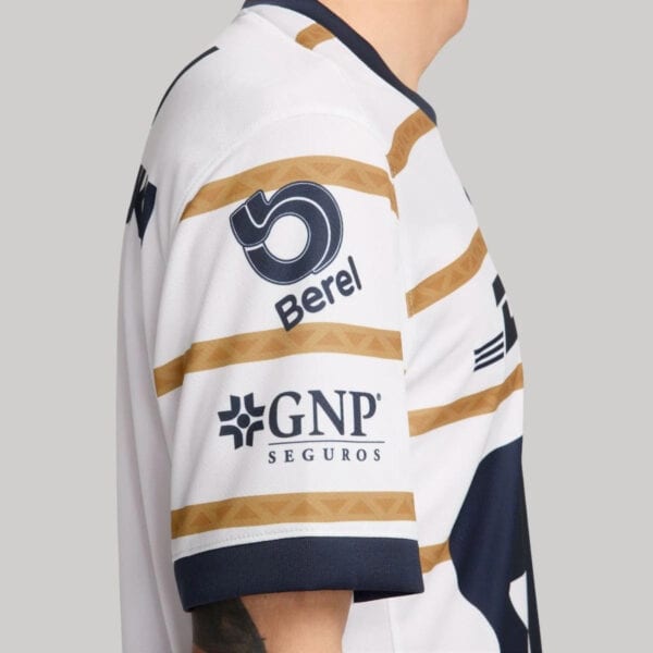 Authentic Pumas UNAM football jersey for 2024/25 season. White with gold and navy accents, featuring.