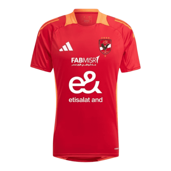Red Al Ahly football training jersey with team logo and sponsor details.