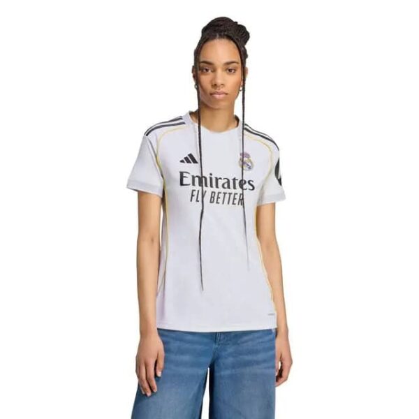 Authentic Real Madrid women's football jersey with team logo and sponsor details.