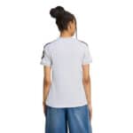 Women's white sports jersey with black accents, back view.