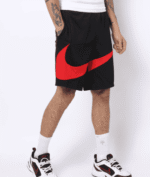Men's athletic Nike Dry Hbr Shorts with large red swoosh logo, black color, and comfortable fit.