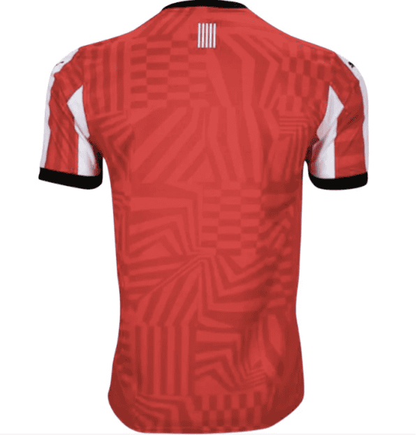 Authentic Southampton FC 2024/25 home football jersey, red with geometric pattern.