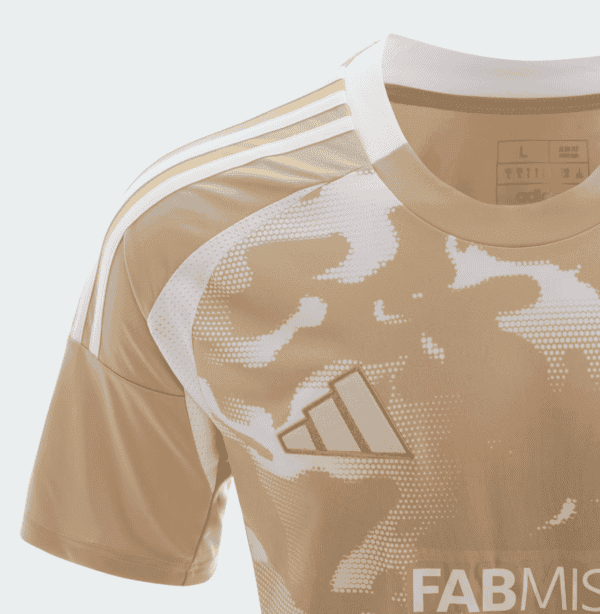 Al Ahly SC third football jersey 2024-2025 with beige and white camouflage design, Adidas logo, and.