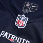NFL Patriots Jersey with Tom Brady logo.