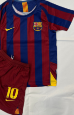 Official FC Barcelona youth football kit featuring Ronaldinho 10, perfect for young fans and players.