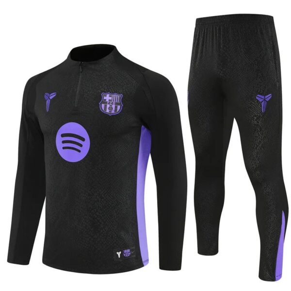 Black football training tracksuit with purple accents and FC Barcelona logo.