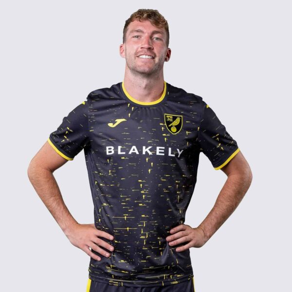 Norwich City away football jersey 2024/25 with club crest and modern design.