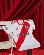 Official River Plate 2023/24 home football jersey with red and white design.