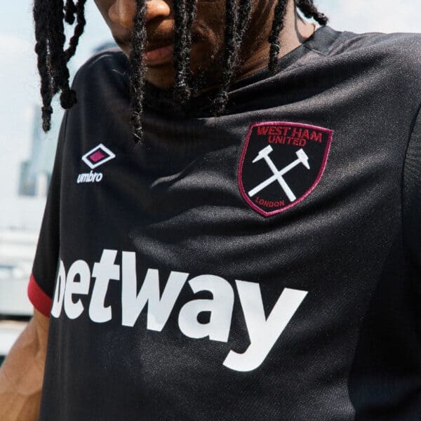 West Ham United black football jersey with sponsor and club badge.