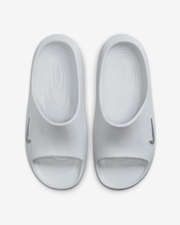 Comfortable grey slide sandals for casual wear and sports activities.