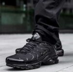 Nike Air Max Plus Triple Black sneakers for men, stylish and comfortable athletic footwear. Perfect.