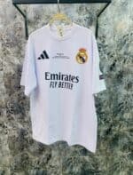 Authentic Real Madrid white football jersey with Adidas logo and Emirates sponsorship, perfect for f.