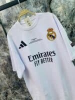 Authentic Real Madrid 2023/24 home football jersey with club crest and sponsor.