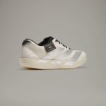 Adidas Y-3 cream training shoes with sleek design and comfortable fit, perfect for running and athle.