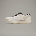 Adidas Y-3 cream training shoes with sleek design and comfortable fit for athletic performance.