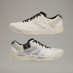 Y-3 cream training shoes with sleek design and comfortable fit, ideal for running and athletic activ.