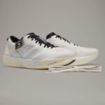 Adidas Y-3 cream training shoes with sleek design and lightweight construction for optimal performan.