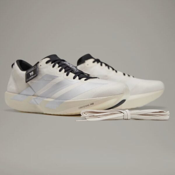 Adidas Y-3 cream training shoes with sleek design and lightweight construction for optimal performan.