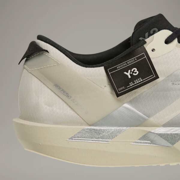 Premium Y-3 cream training shoes with sleek design and lightweight construction. Perfect for athleti.