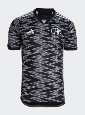 Atlético Mineiro third football jersey 2024/25 with bold zigzag black and white design.