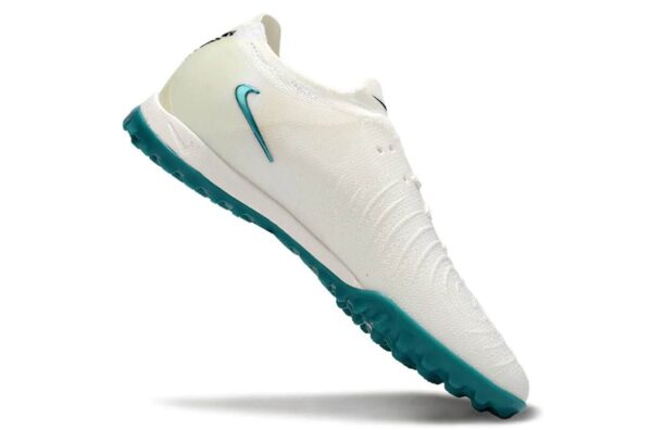 High-performance Nike Phantom GX II Elite Society soccer cleat in white and green, designed for prec.