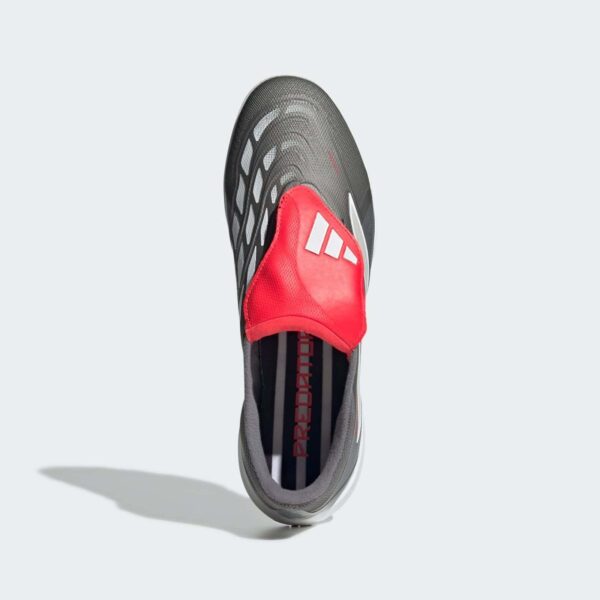 High-performance Predator League turf football shoes with fold-over tongue for optimal grip and cont.