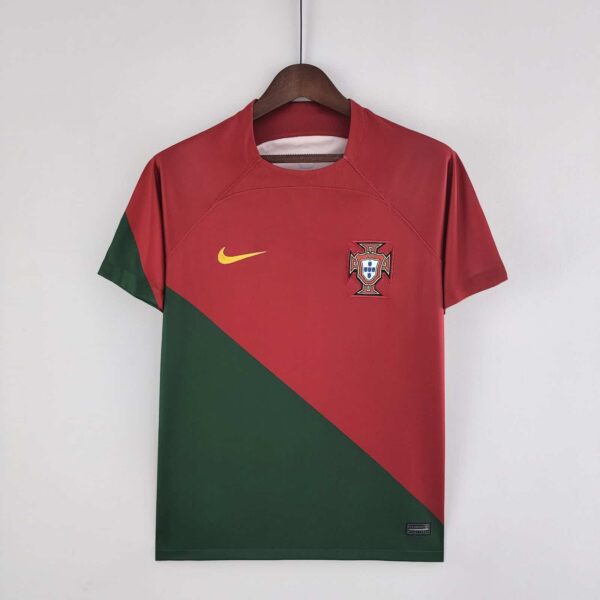 Portugal 2022 World Cup home football jersey with Ronaldo logo, red and green design.