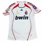 AC Milan 2022/23 Champions League away football jersey with Bwin logo and team crest.