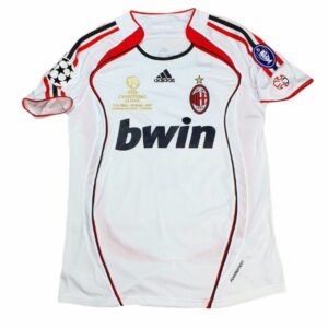 AC Milan 2022/23 Champions League away football jersey with Bwin logo and team crest.