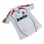 AC Milan 2009/10 away football jersey with official club logos and sponsor.