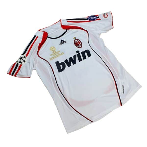 AC Milan 2009/10 away football jersey with official club logos and sponsor.