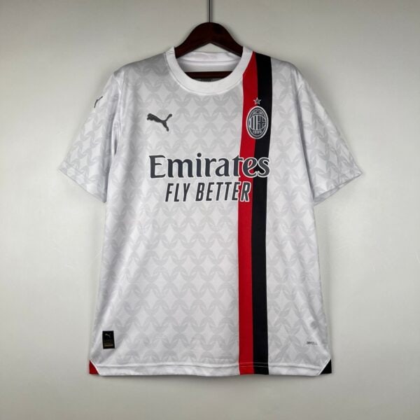 Emirates Milan soccer jersey with club logo and sponsor.