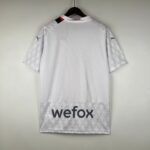 Authentic football jersey with "wefox" sponsor and Puma logo, perfect for sports fans and players.